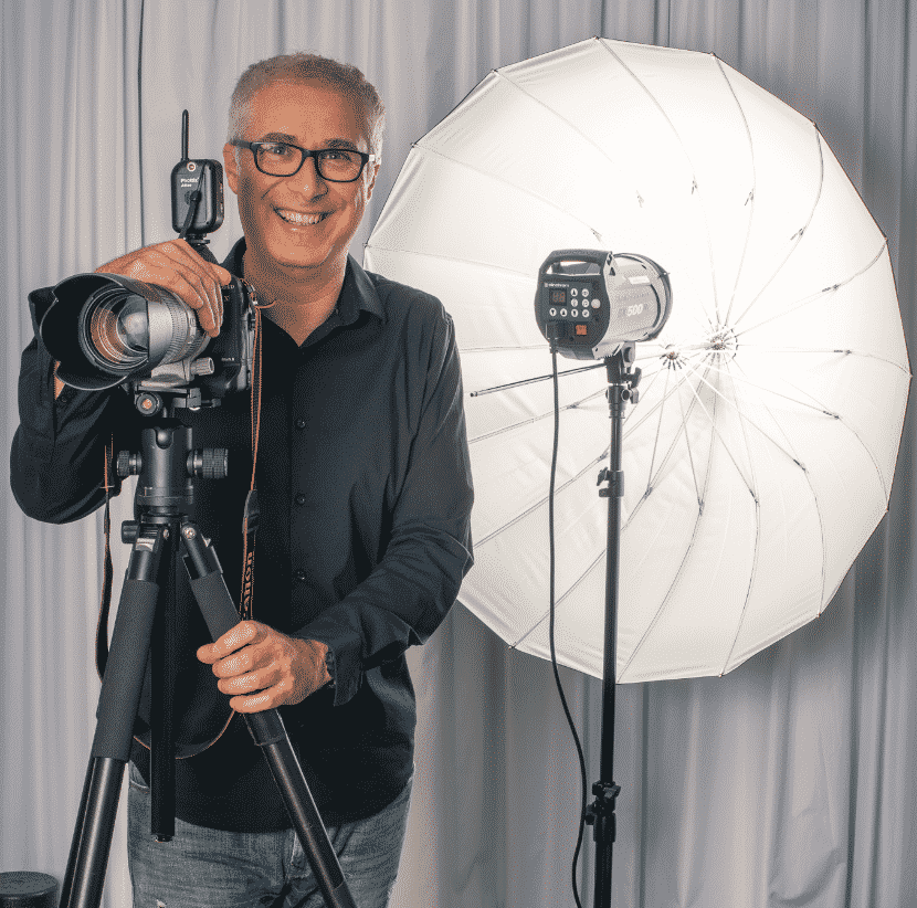 Dan Cantero, Sydney headshot photographer, with his camera and studio lighting