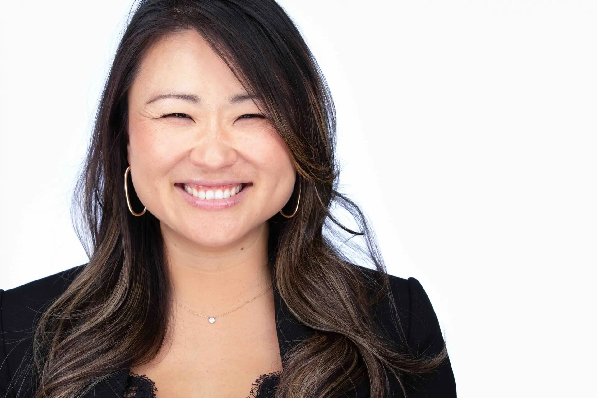 Corporate headshot Sydney, smiling woman